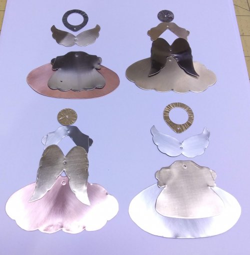Judy Larson's Angel Ornament  - , Holiday Designs, Cutting, Cutting Tool, Cutters, Forging, Forging Jewelry, Jewelry Forging, How To Punch Holes, Hole Punching, Punch A Hole, Stamping, Stamps, Texturing,  lay the pieces out to decide which ones to use together.